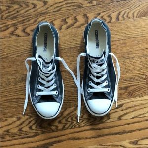Converse All-Stars. Men’s size 7, women’s size 9.